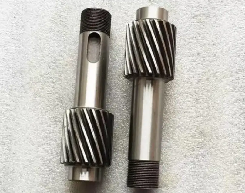 Image of two involute spline shafts showing curved and well-defined teeth