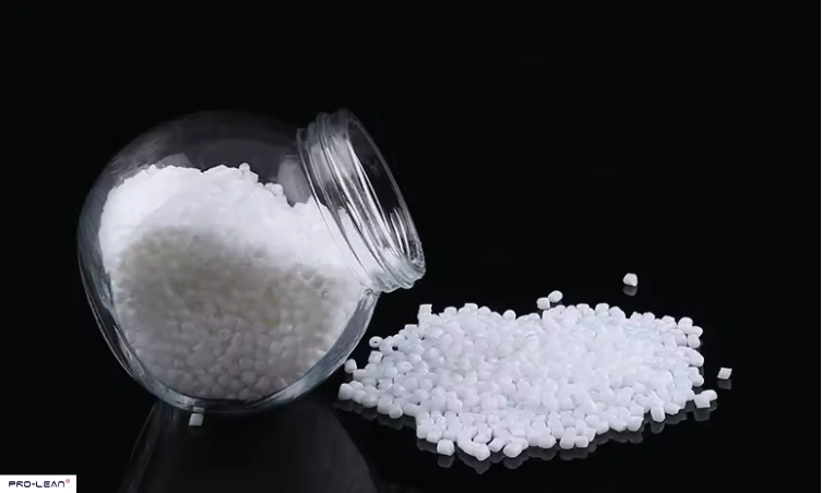 Clear jar tipped over, spilling white Polyoxymethylene granules.