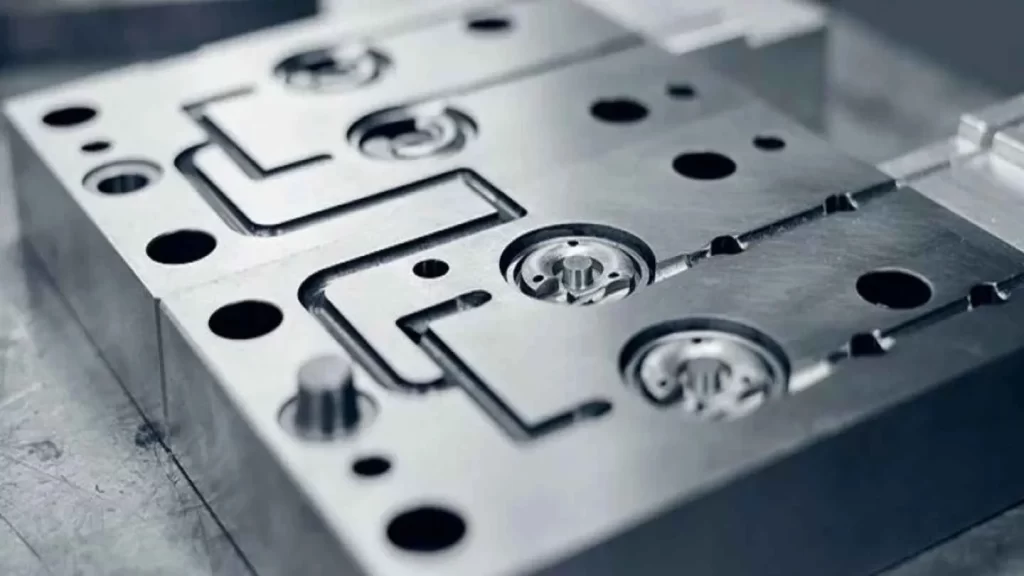 The image showcases a close-up of a rigid hard tooling mold. It emphasizes its strong and durable design.