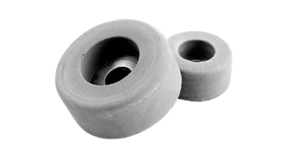 Image showing round-shaped rubber products made using the transfer molding process.