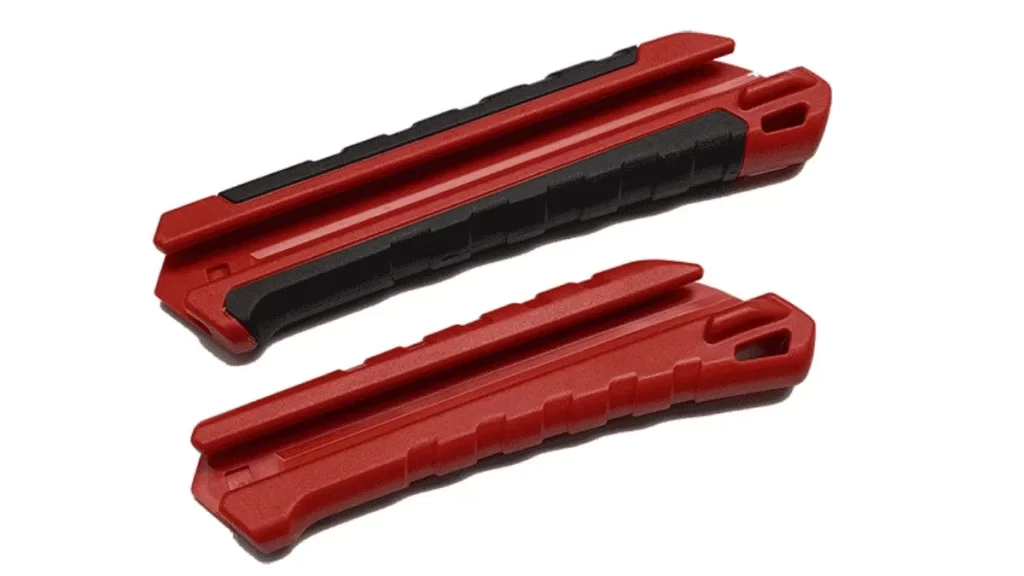 Close-up view of a two-shot injection molded product showing clear detail of the dual-material construction.