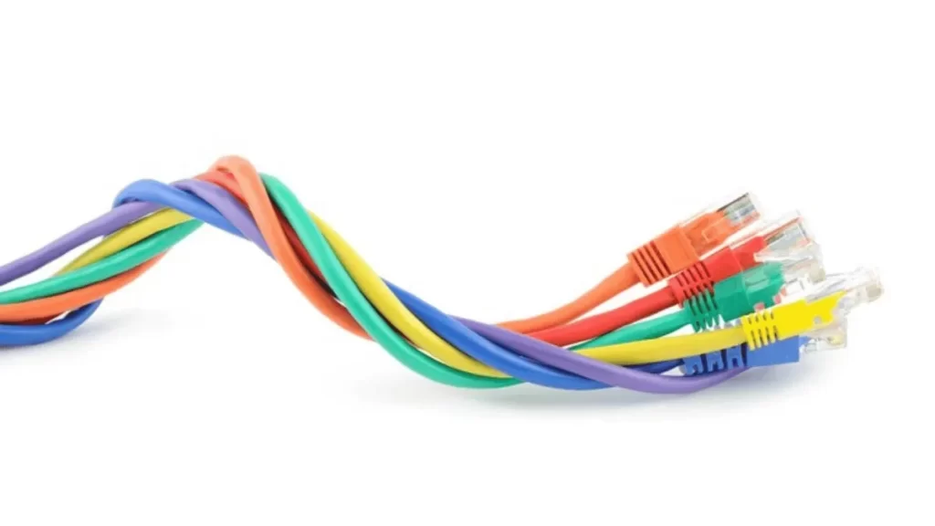 Vibrantly colored electronic wires made using two-shot injection molding.