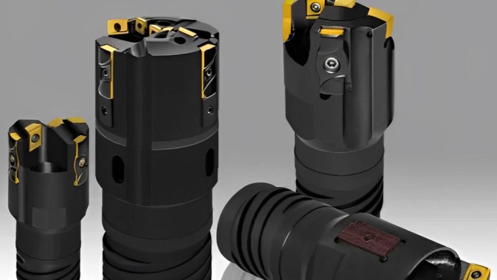 Several dark metal drilling tool heads