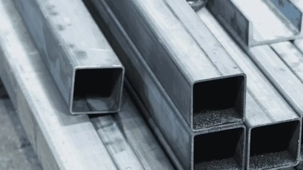 Square carbon steel bars arranged in a stack.
