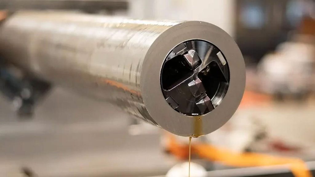 Close-up of a deep hole drilling machine's cutting head