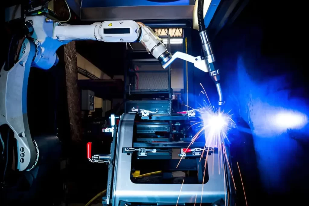 A robotic welding machine performing welding on a metal component.