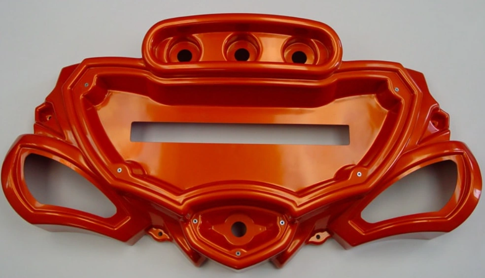 A red thermoformed polystyrene part for a gaming component 