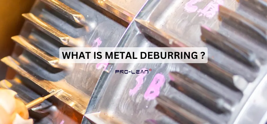 Deburring tool scraping deburrs on a large gear / wheel with text “What is metal deburring”