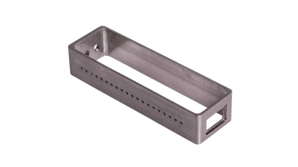 The image shows a precisely crafted Kovar electronics box with clean edges and defined dimensions.