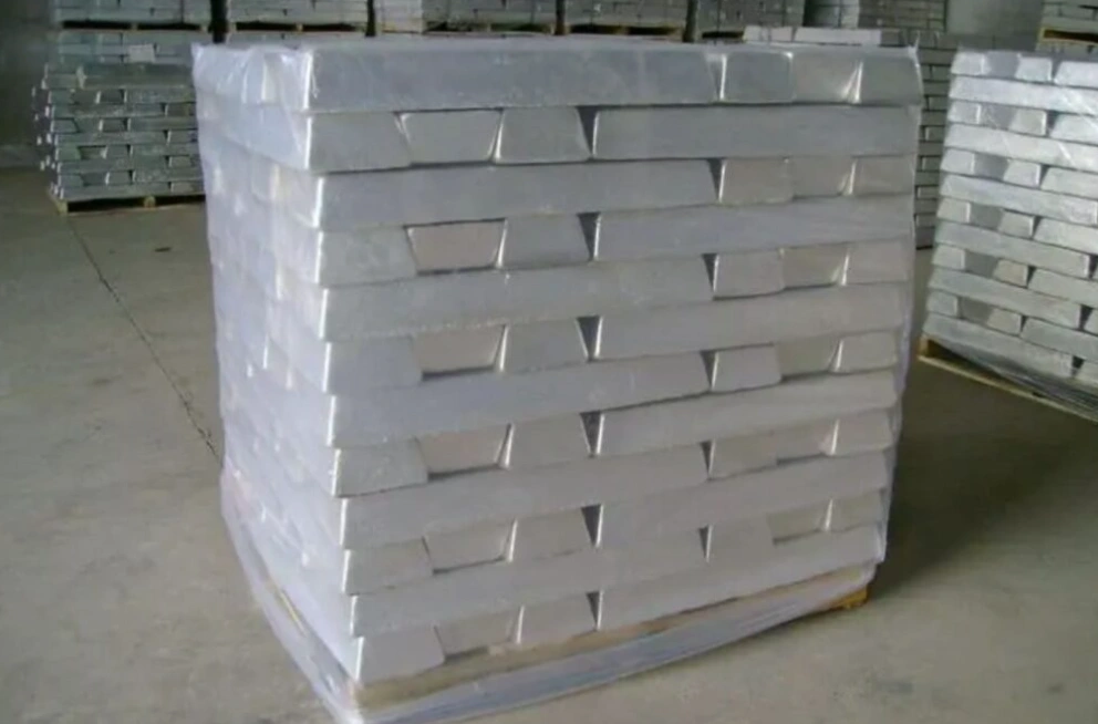 Several piles of magnesium ingots placed on a floor