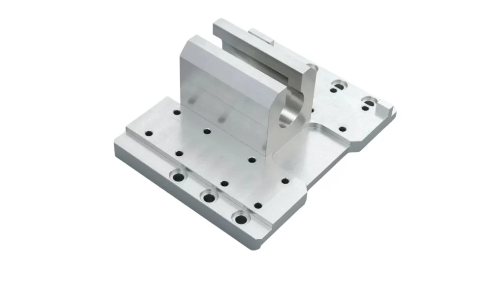 The image shows a mechanical robotic component made of steel being machined through step turning.