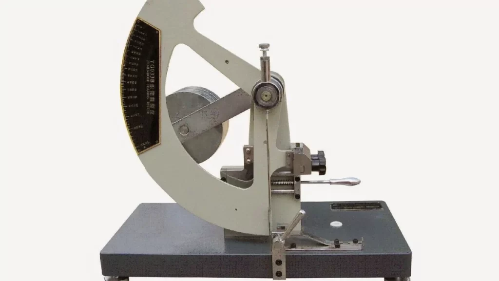Tear tester for material strength evaluation.