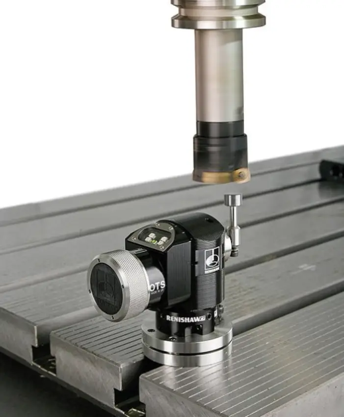 Automatic tool setter probe installed on a CNC machine table measuring tool length and diameter for automated tool offset calibration
