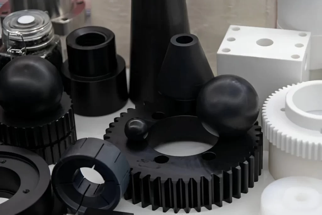Durable aerospace plastic parts in white and black colors.
