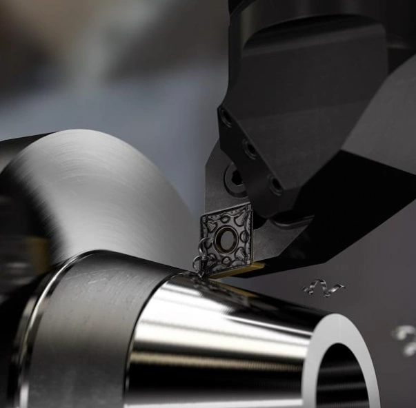 CNC turning tool performing precision surface finishing on a metal workpiece