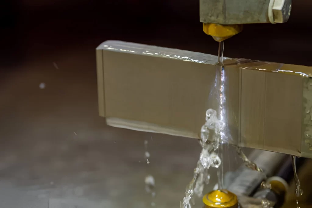 EDM machine cutting a metal part.