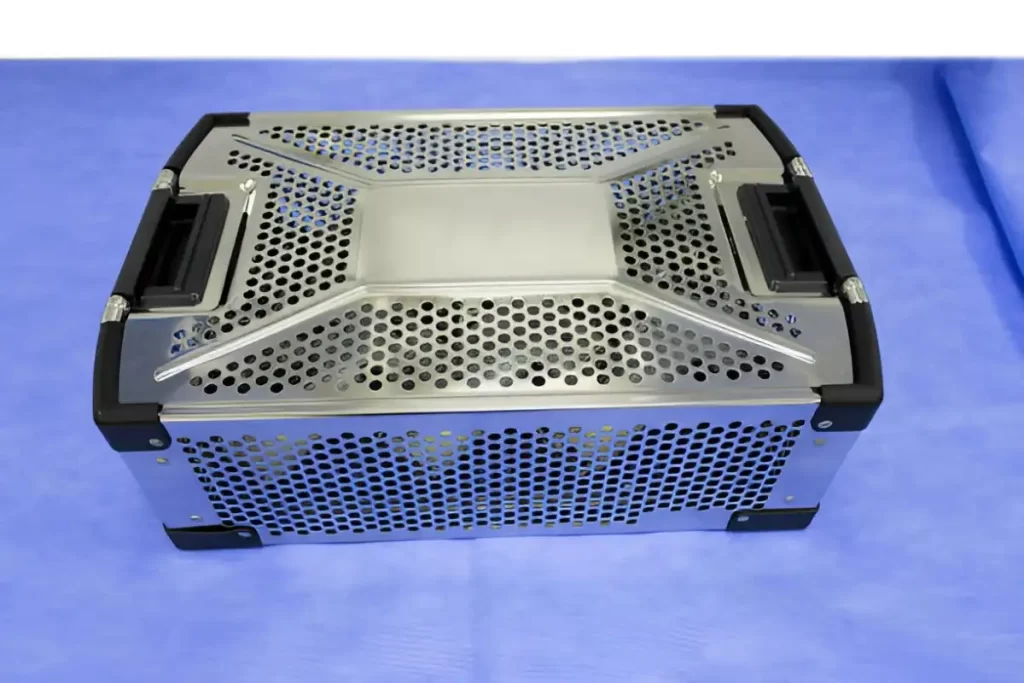 A sterilization container for medical surgical instruments on display.