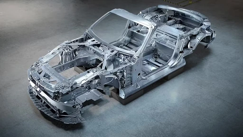 A monocoque frame with various sheet metal parts assembled in it. 