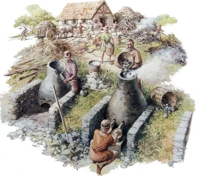 Historical illustration of medieval iron smelting operations showing metallurgists operating furnaces and processing iron ore in a rural village setting