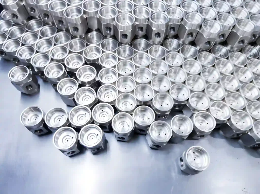 Batch of polished steel components ready for quality inspection.