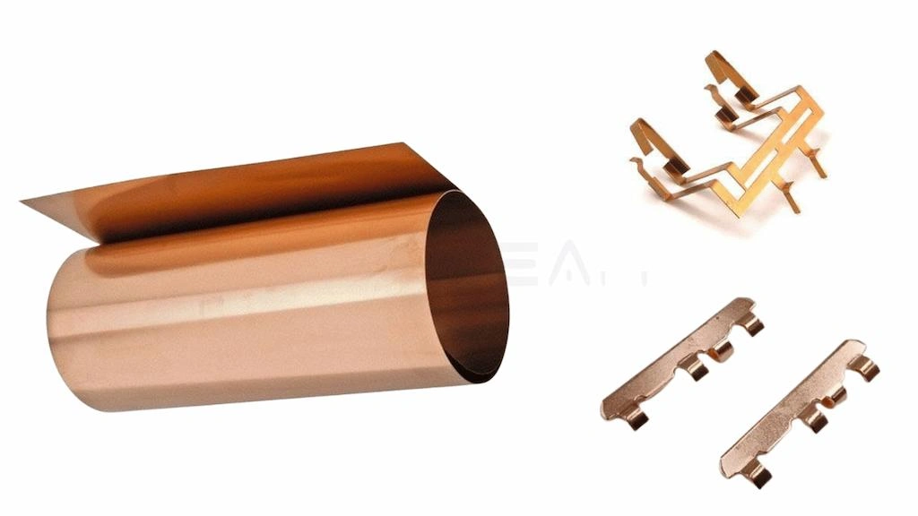 A coil of  bronze metal sheet and stamping parts side by side