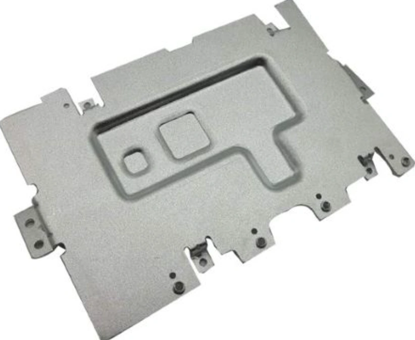 Automotive heat shield with joggled edges for flush mounting, improved stiffness, and effective thermal protection