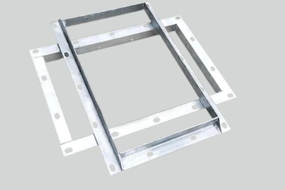 An angle sheet metal frame bracket with welded corners and mounting holes