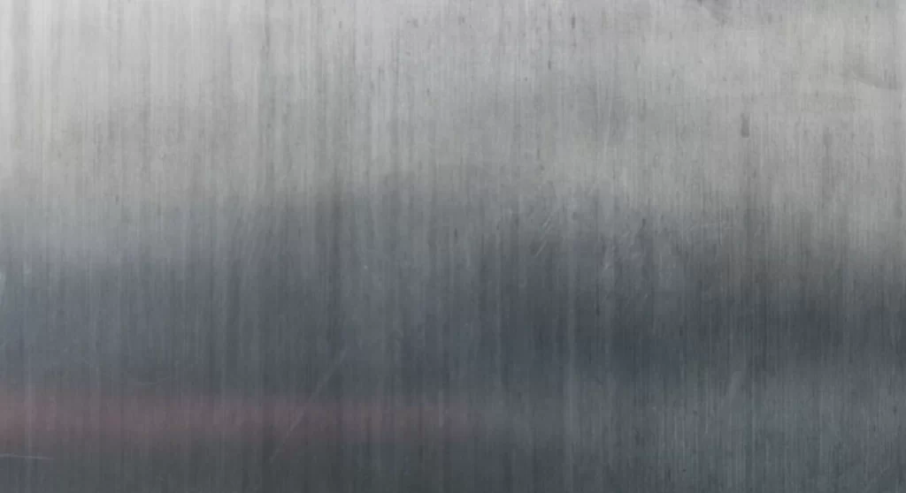 Galvanneal steel surface showing matte gray finish