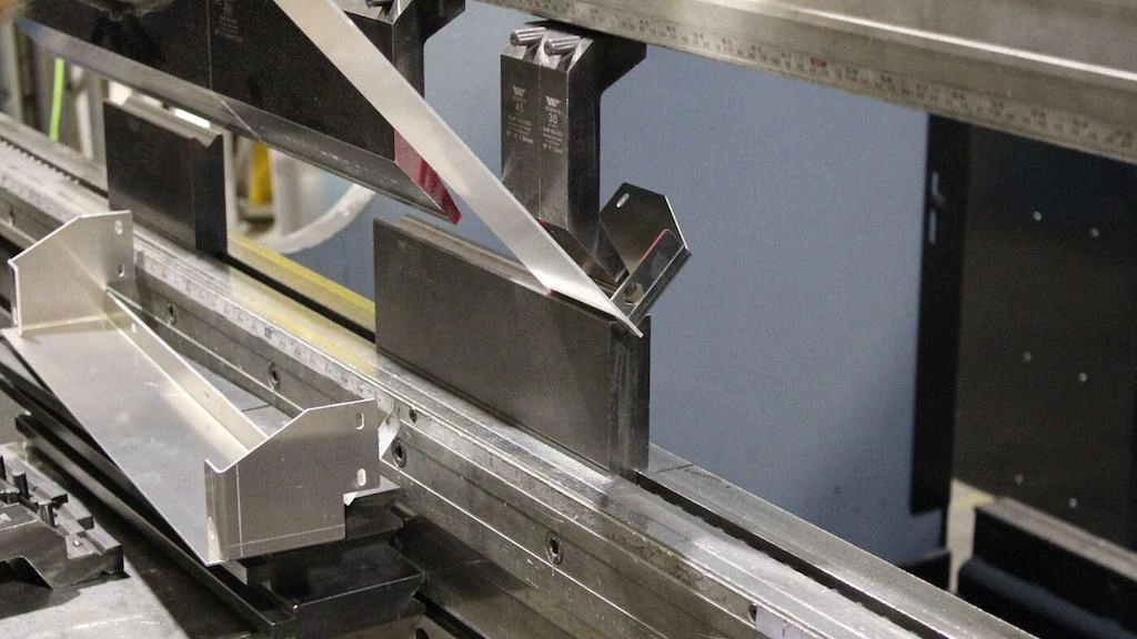 A close-up view of steel bending and forming 