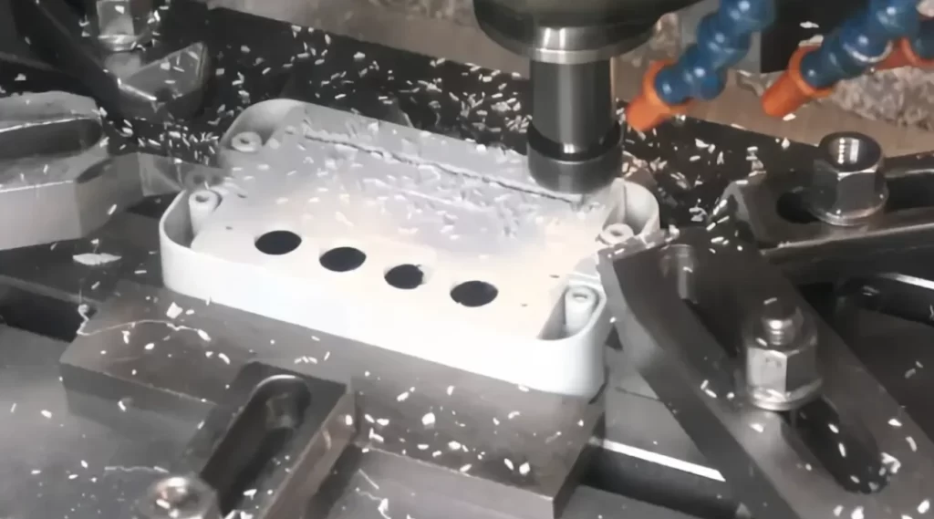 CNC milling polypropylene part with chip formation during an active machining operation
