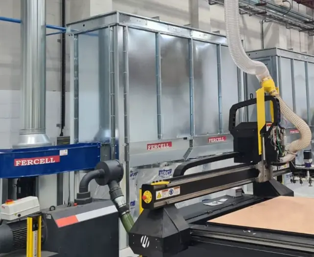 Industrial dust extraction system with filtration unit for phenolic machining operations