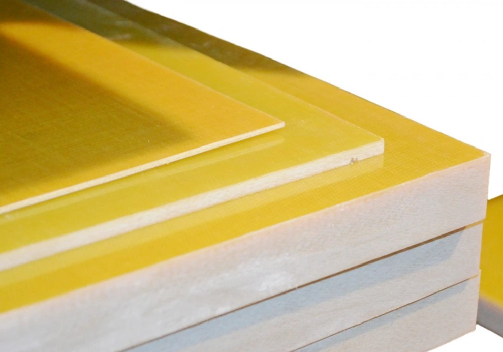 Glass-based phenolic resin sheets in yellow showing stacked laminate layers