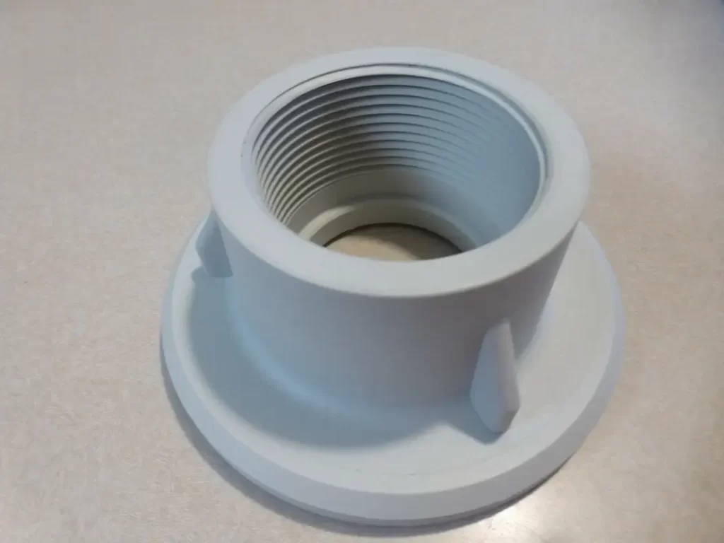 Machined glass-reinforced polypropylene flanged fitting with precision internal threading and mounting base