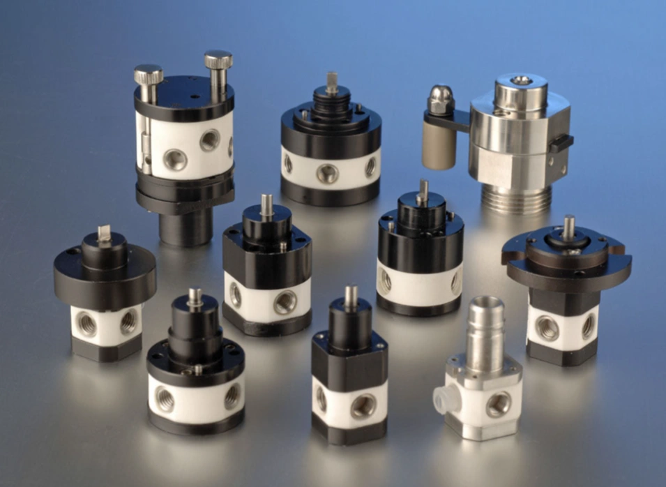 CNC-machined ceramic valve components and assemblies with threaded ports, flanges, and precision-fit ceramic inserts