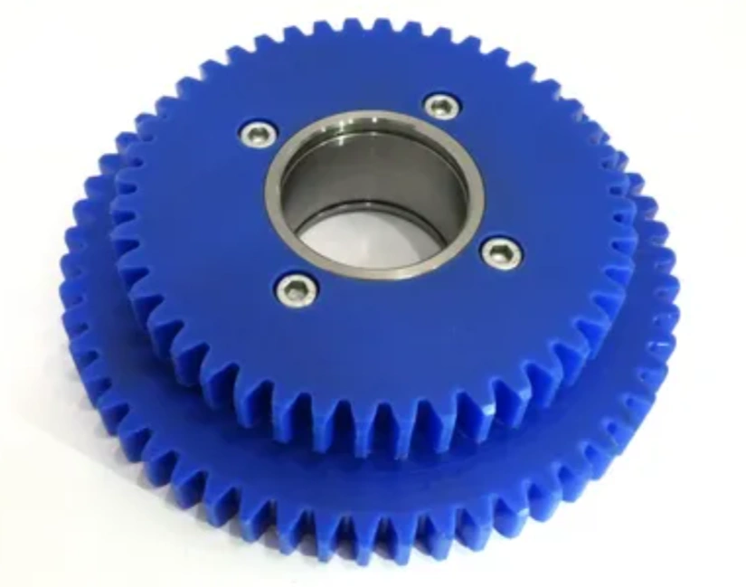 Blue phenolic resin thermoset gear with metal center hub and mounting holes
