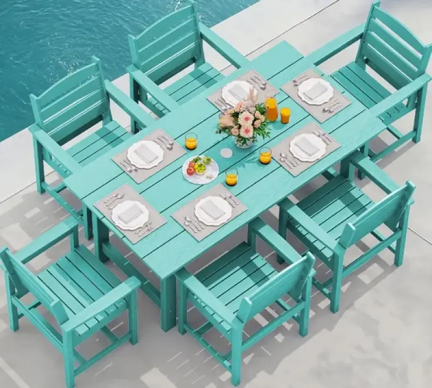Turquoise HDPE outdoor dining set with table and chairs by poolside