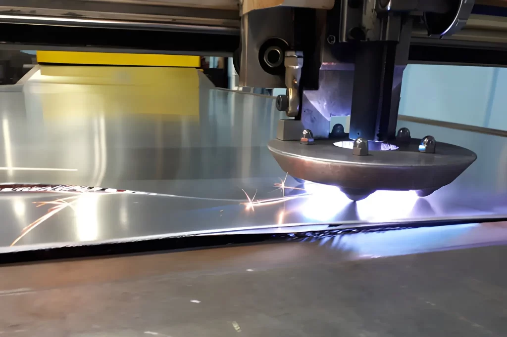 Aluminum sheet being cut with a CNC plasma cutter.