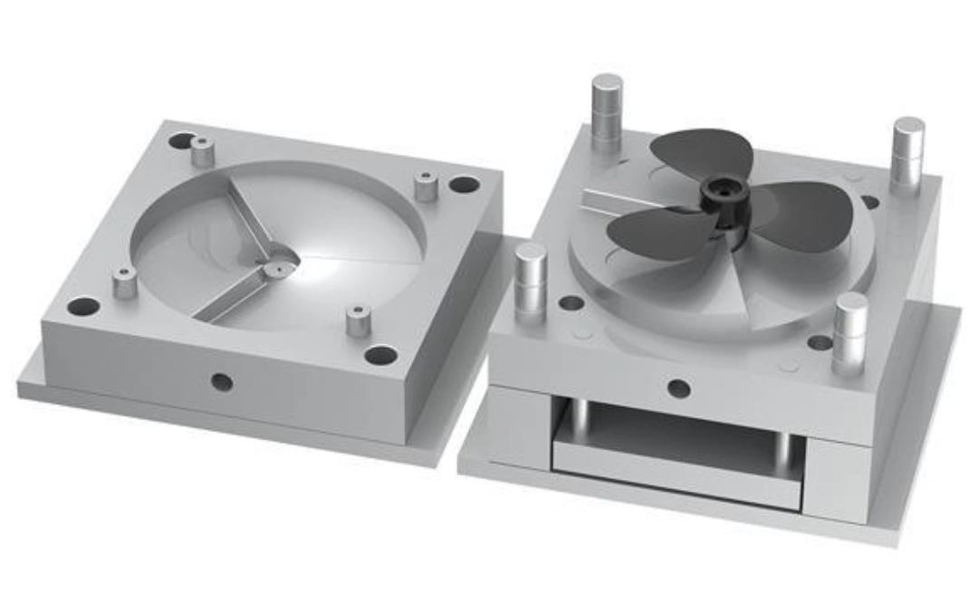 Single-cavity injection mold showing split mold halves with circular part cavity, ejector pins, and cooling channels