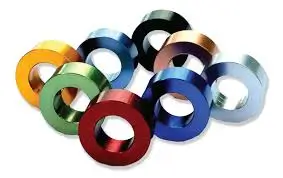 Assorted Type II sulfuric anodized aluminum rings in various vibrant colors demonstrating the decorative dye absorption capability of the oxide layer.