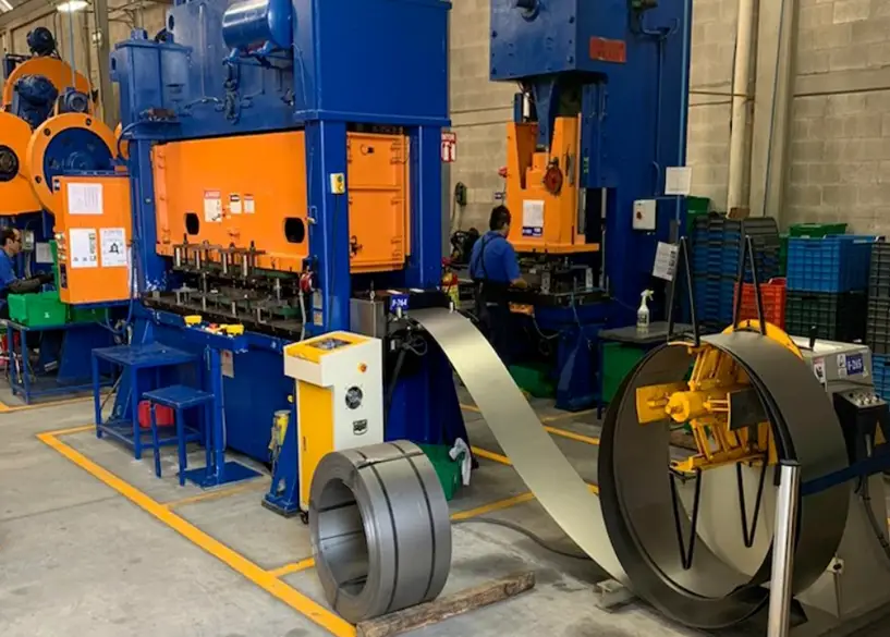 Industrial metal stamping press line with coil feeding system