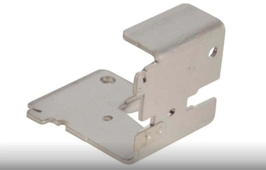 Stamped metal heat sink retention clip with mounting features