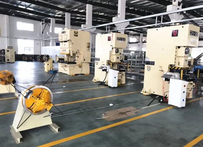 Automotive stamping factory floor with multiple servo press lines and coil feeders