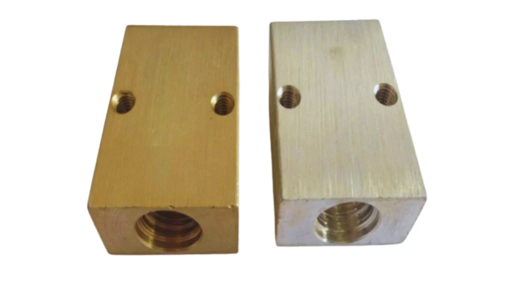 Custom metal parts showing surfaces before and after Alodine yellow coating.