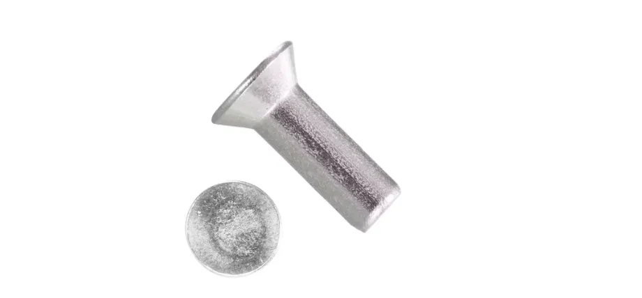 Uninstalled solid rivet with a conical countersunk head designed to sit flush with the surface