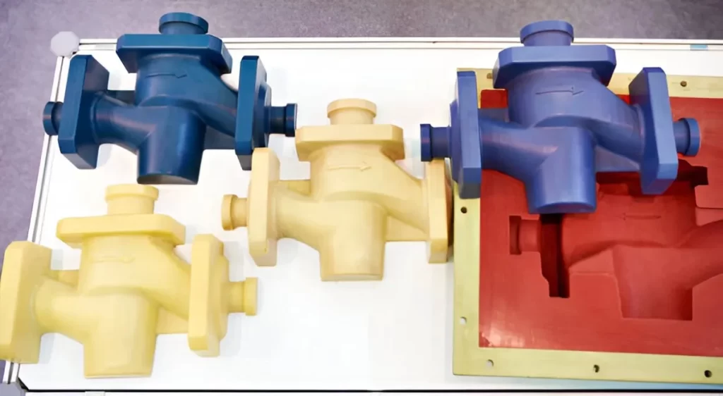 A collection of custom plastic injection molded parts in vibrant colors is shown.