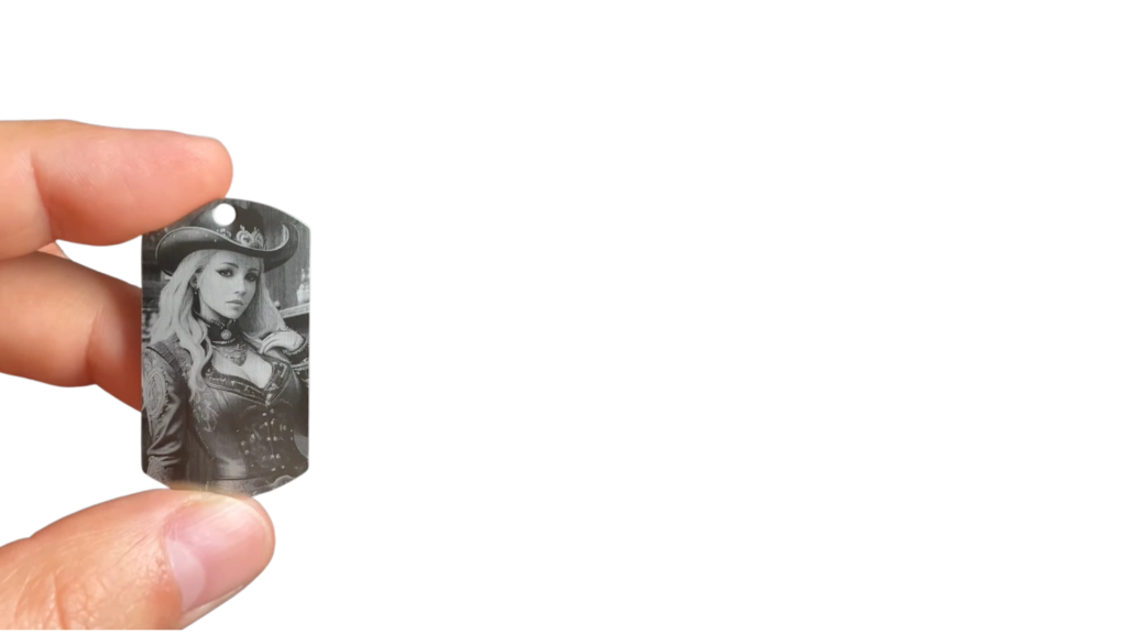 The image shows a stainless steel surface with a laser-engraved portrait of a girl.