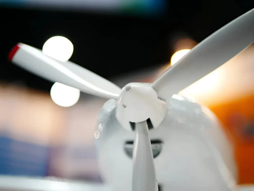 A close-up view of an aircraft wing component made from polypropylene. The image shows the smooth surface and lightweight design used in aerospace.