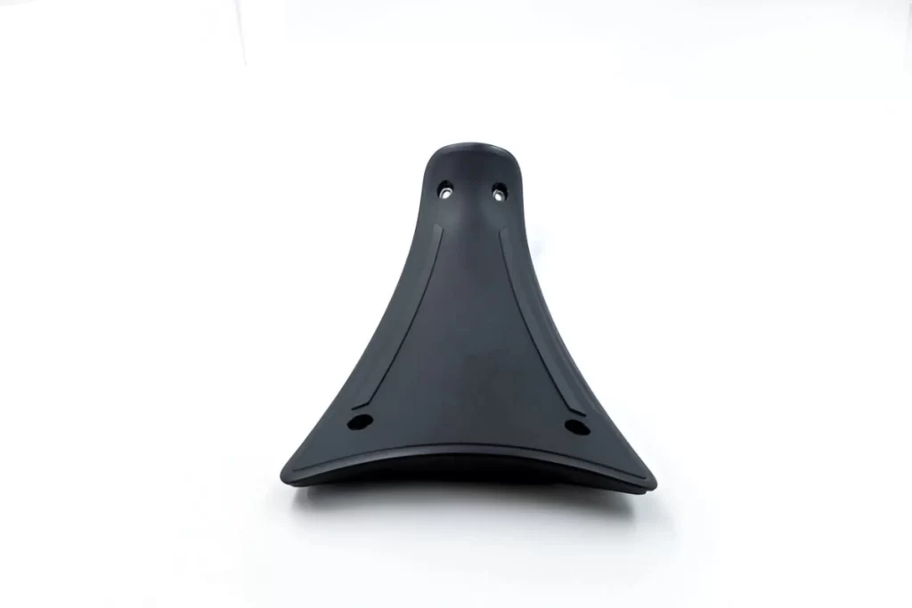 A black thermoplastic polyurethane (TPU) or thermoplastic vulcanizate (TPV) part shown against a clean white background.