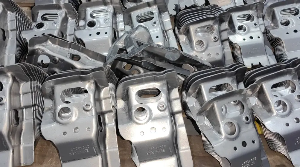 Batch of complex stamped aluminum automotive components