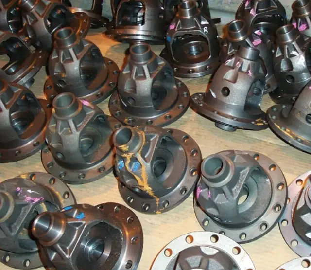 Collection of industrial steel flanges showing surface yellow rust